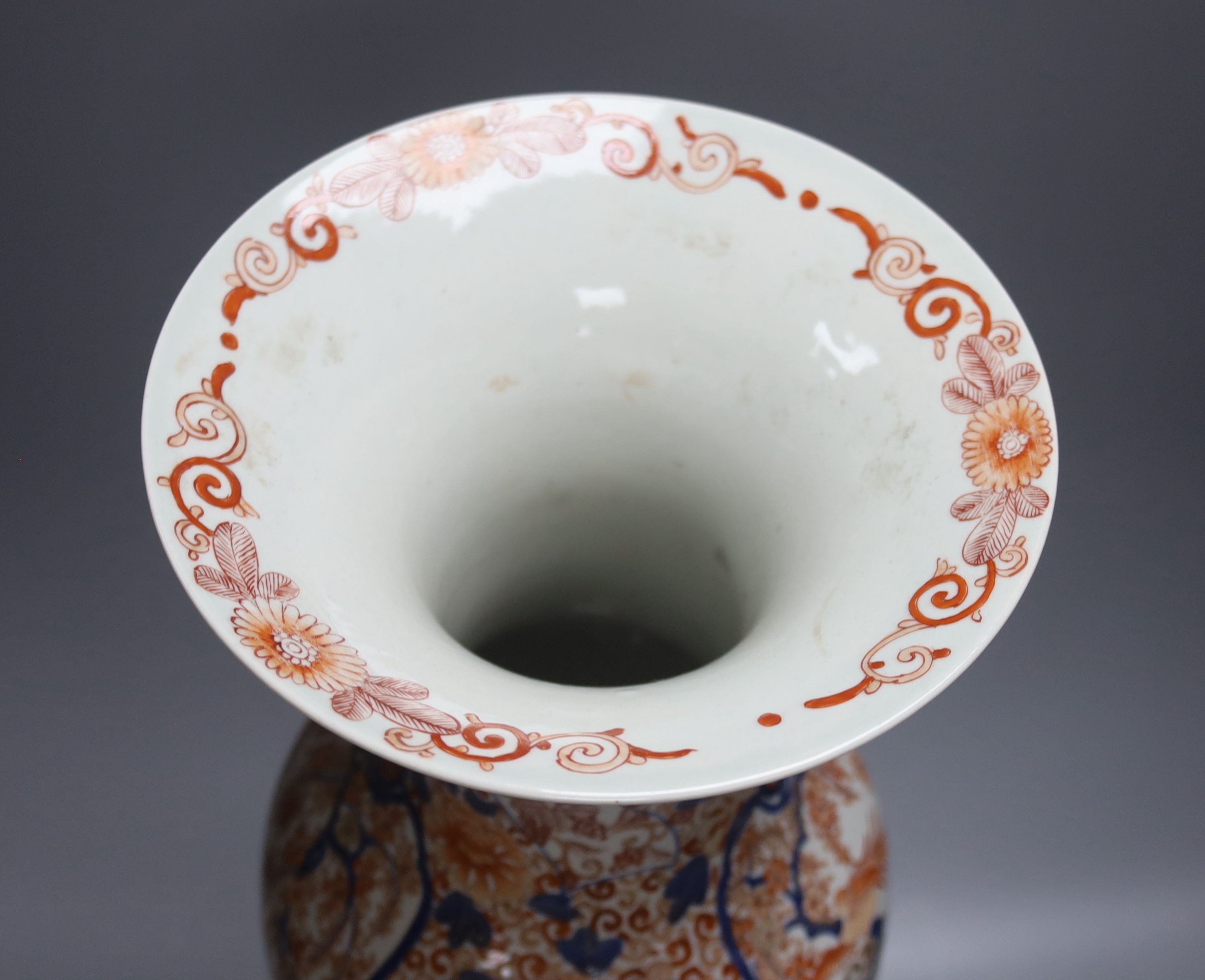 A large 20th century Japanese Arita porcelain vase, wood stand, restored 50cm
